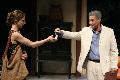 Marin Hinkle and Francois Chau in <I>Extraordinary Chambers</I> at the Geffen Playhouse. Photo by Michael Lamont.