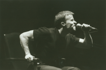  <i> Murmuring in a Dead Tongue </i>  (1998), directed by Gus Reyes, performed by the author, The Next Stage Company.