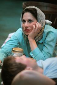 Anisah (Sarah Corey) and Bo (Matt Dickson) catch fireflies in the Alabama Shakespeare Festival production.