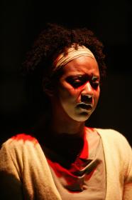 Tracie Thoms in <I>Red Again</I>. Photo by T. Charles Erickson