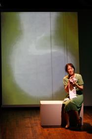 Sue Jean Kim in <I>I Have Been to Hiroshima Mon Amour</i>. Photo by Carol Rosegg