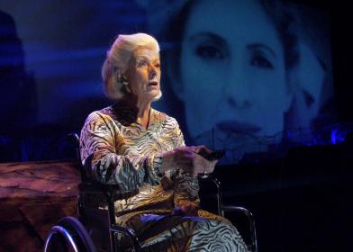 "Oh my God, I’m talking with myself?" Miss Wells (Mimi Cozzens) talks with her younger self (Emily Kosloski).